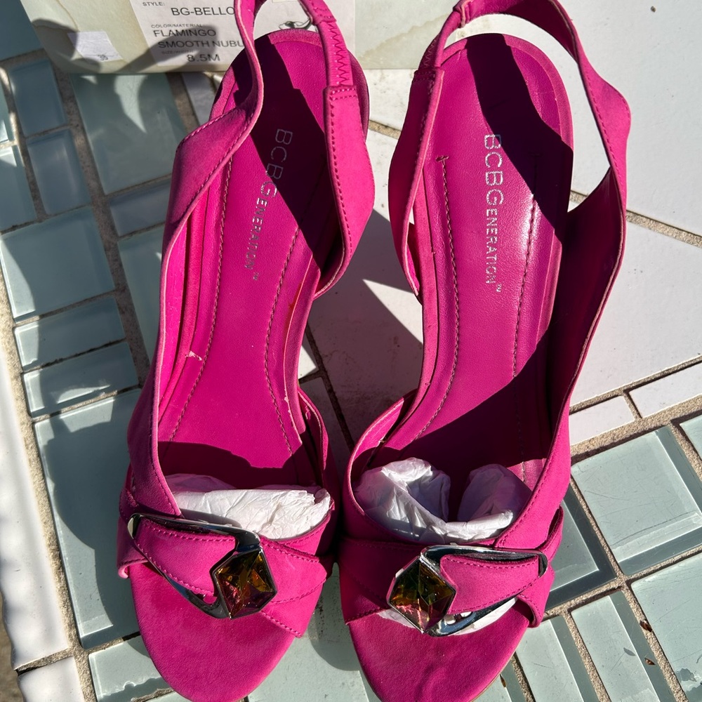 Hot pink suede bejeweled sling back heels.